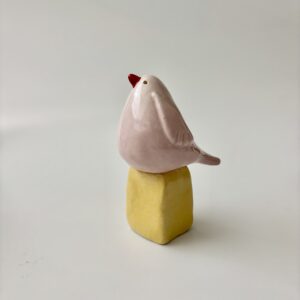 Vogel in wit/ roze
