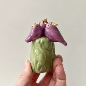Vogels paars/ goud op groen stammetje